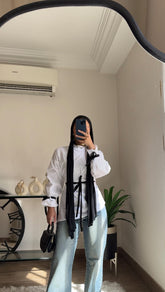 "White Whisper Blouses